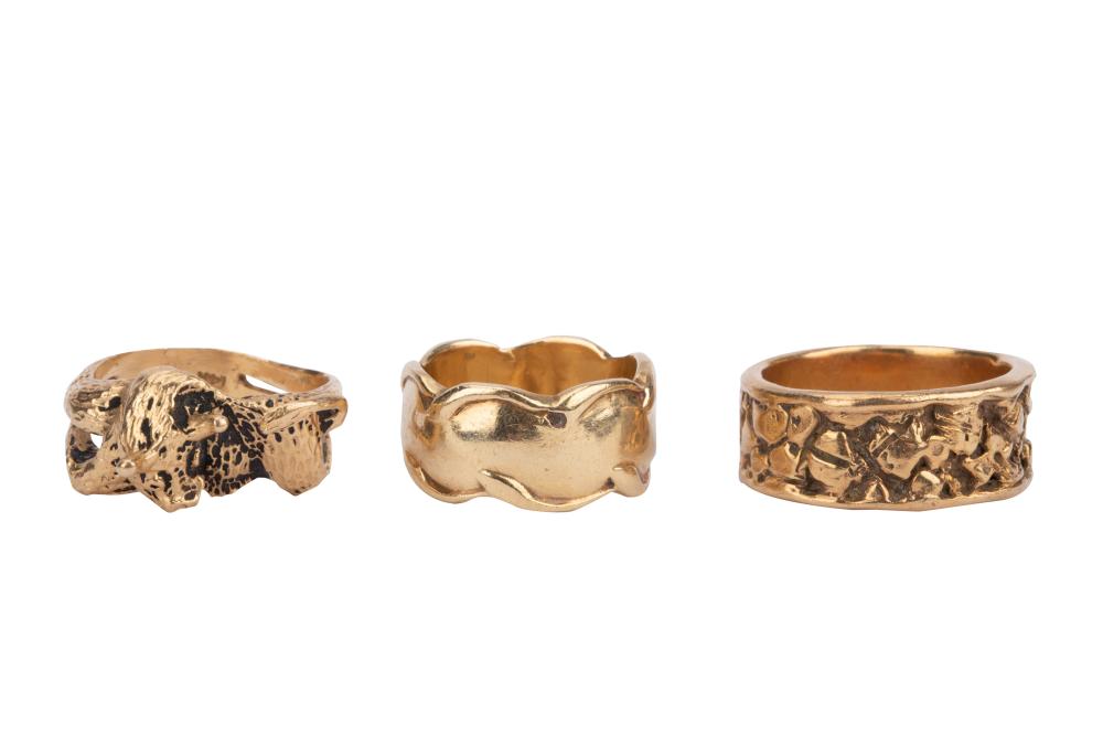 THREE 14 KARAT YELLOW GOLD RINGScomprising