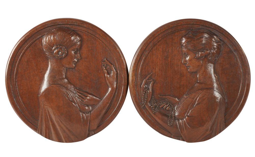 TWO CARVED WOOD RELIEF PLAQUESone