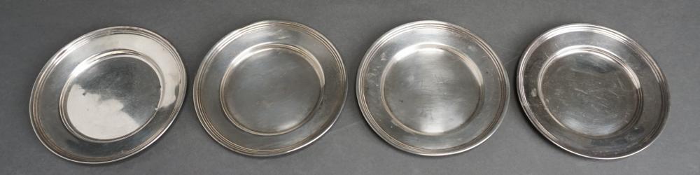 FOUR STERLING SILVER BREAD PLATES,