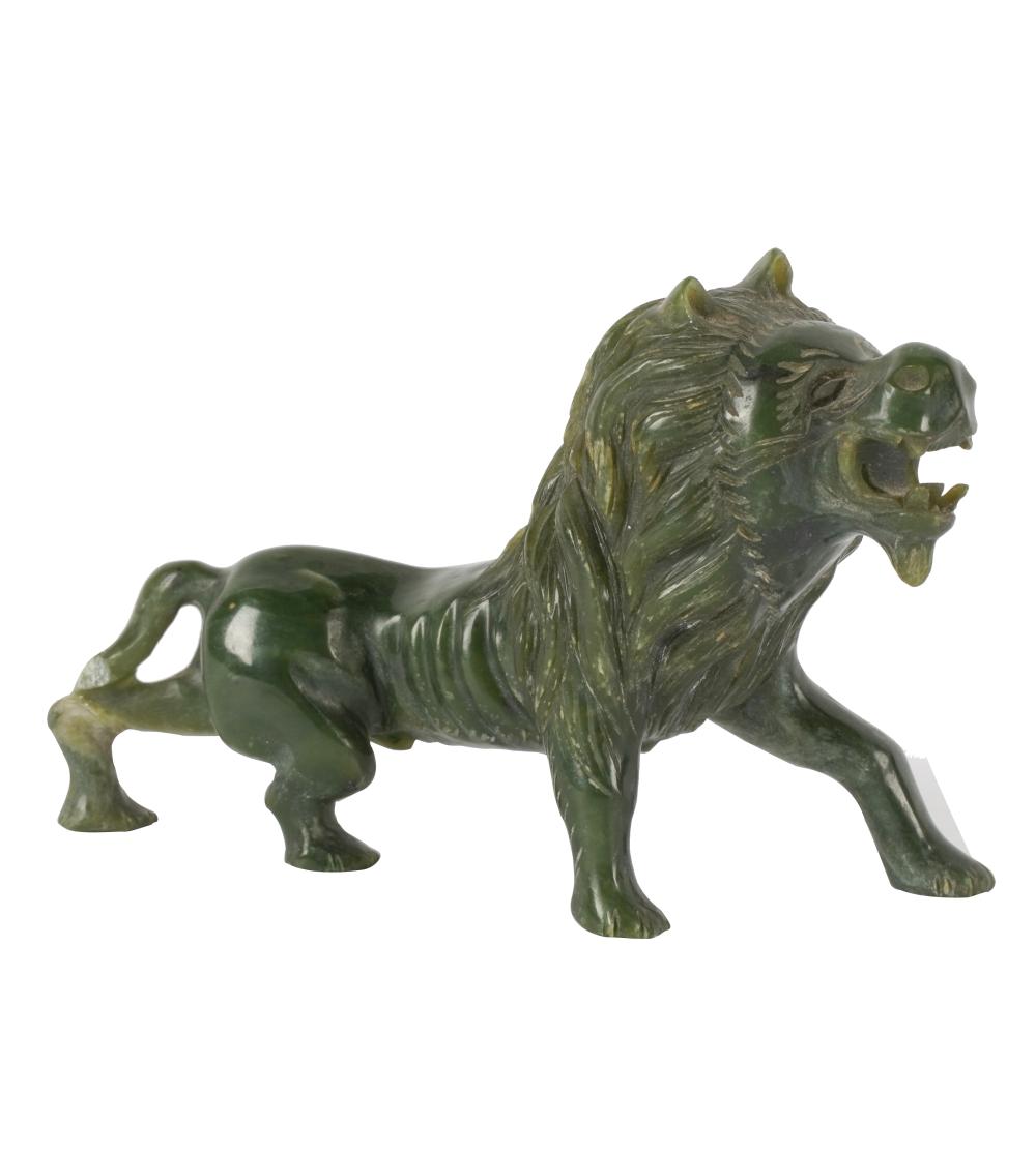 ASIAN CARVEDJADE LION FIGURECondition: