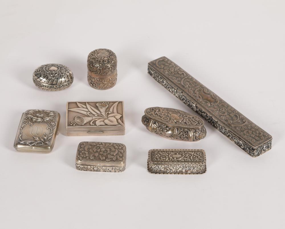 GROUP OF REPOUSSE SILVER BOXEScomprising