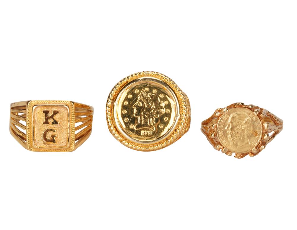 THREE 14 KARAT YELLOW GOLD RINGScomprising