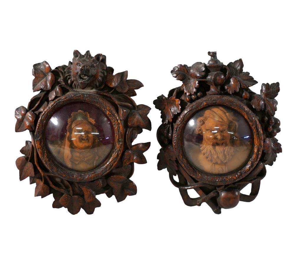 PAIR OF BLACK FOREST FRAMED WOOD 33180a