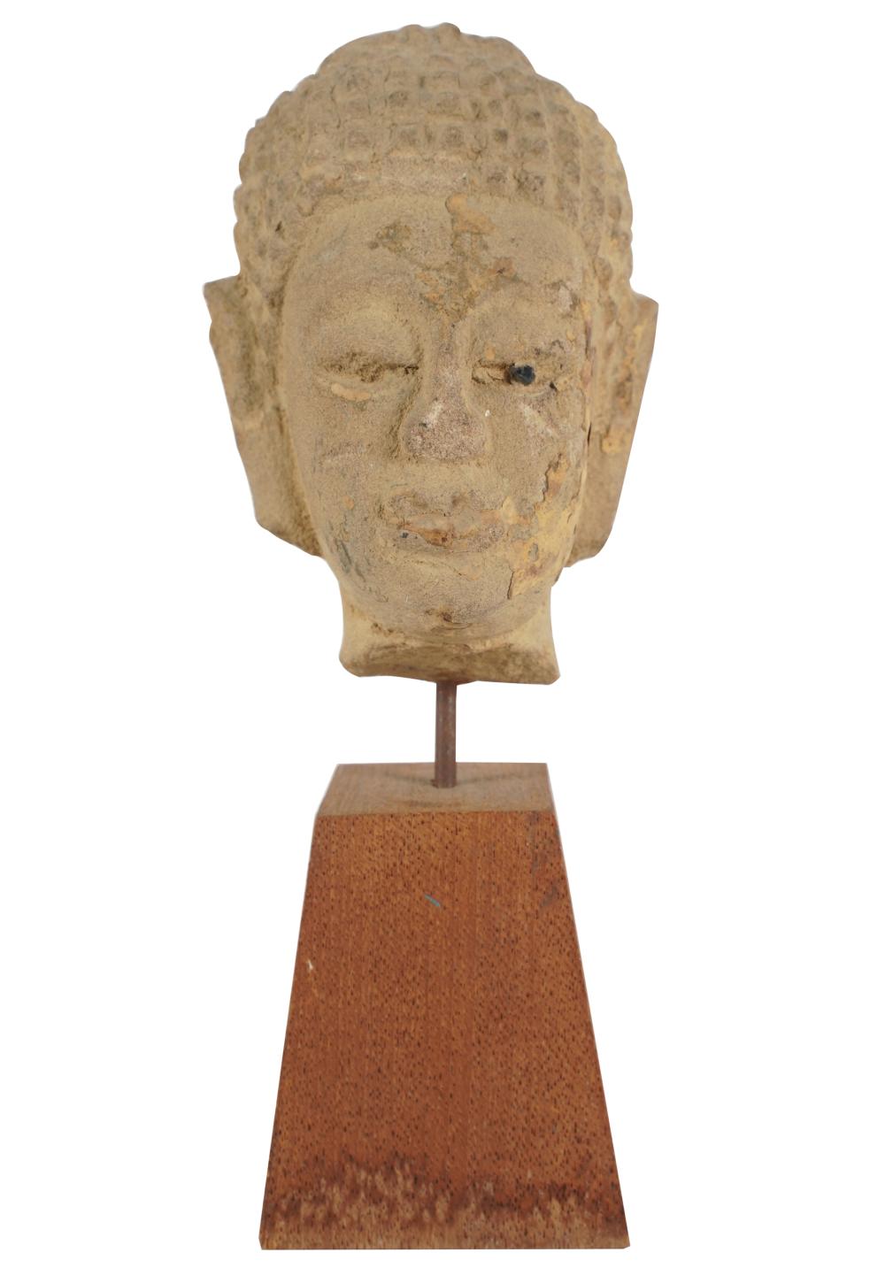 CARVED STONE HEAD OF BUDDHAmounted