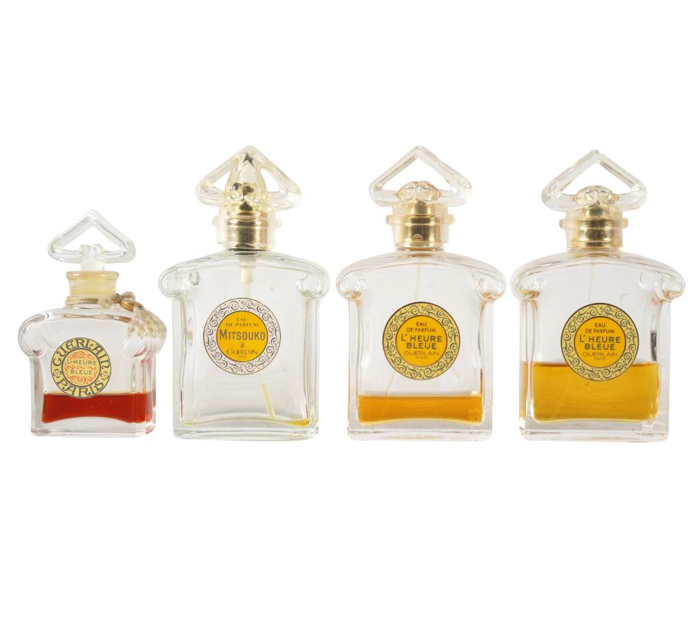 FOUR GUERLAIN PERFUME BOTTLEScomprising