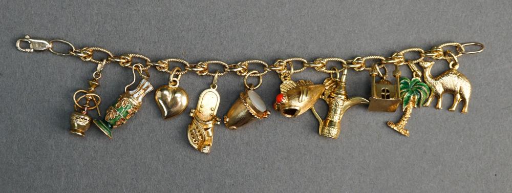 14 KARAT YELLOW GOLD CHARM BRACELET 32fbac