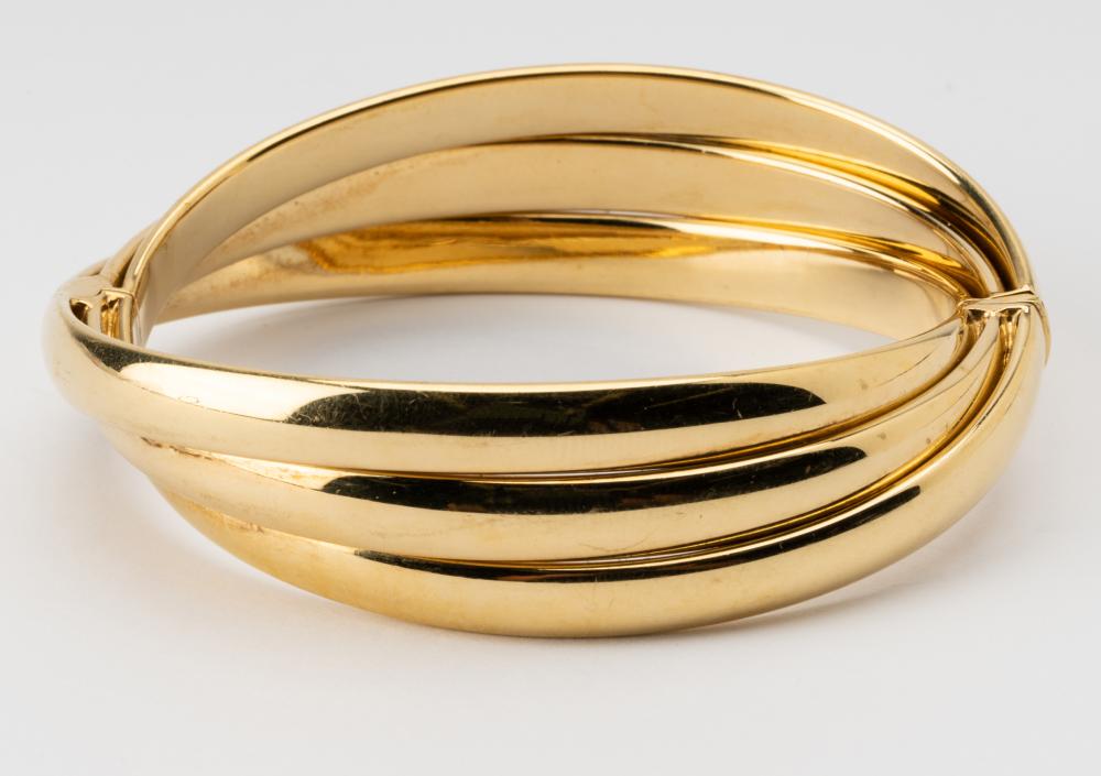 18 KARAT YELLOW GOLD TWIST BANGLE