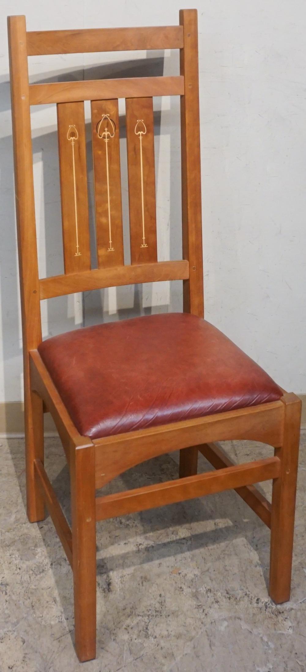 STICKLEY INLAID OAK AND RED LEATHER