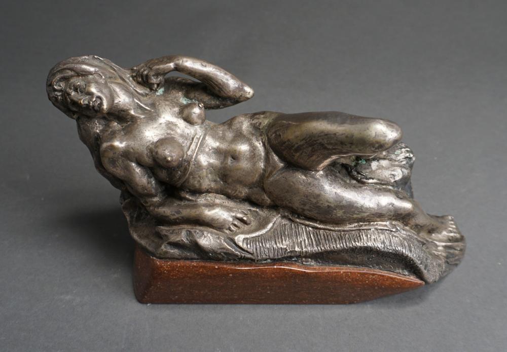 POLISHED METAL FIGURE OF RECLINING