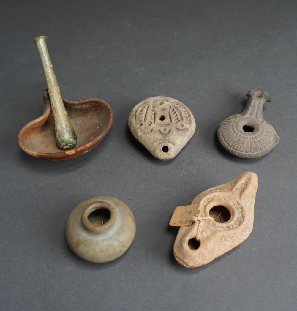 FOUR ROMAN EMPIRE POTTERY OIL LAMPS,