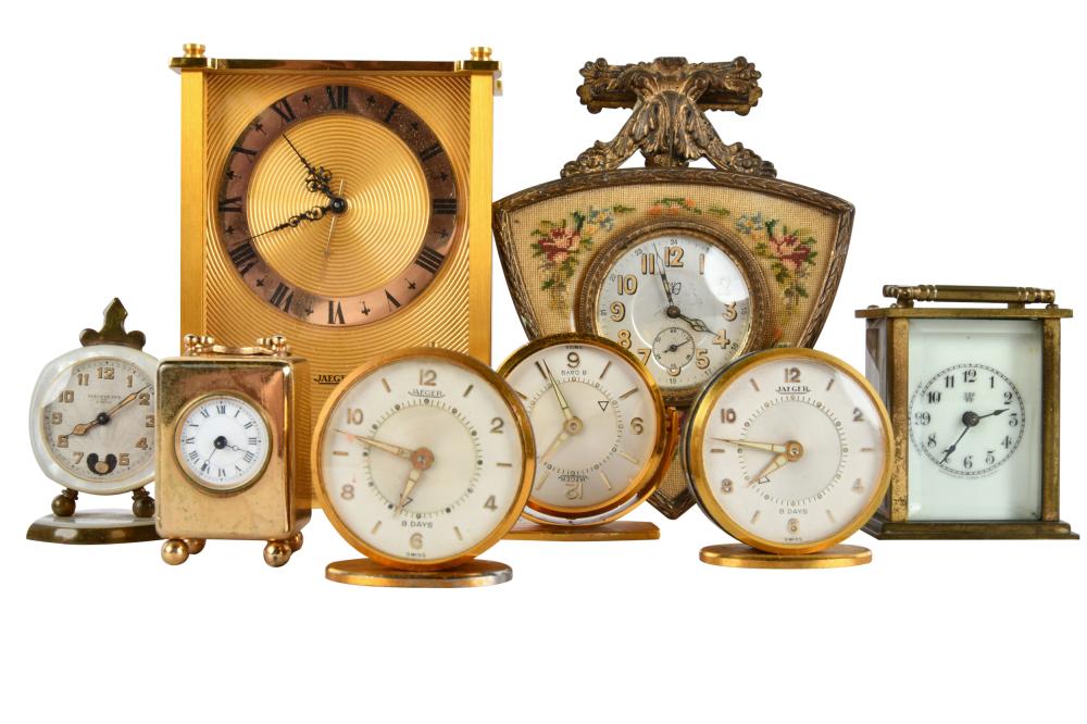 COLLECTION OF EIGHT TRAVEL CLOCKScomprising  33309a