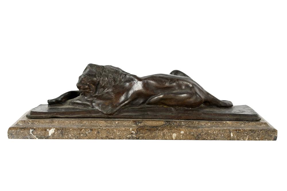 BRONZE FIGURE OF A RECLINING LIONsigned 3334a0