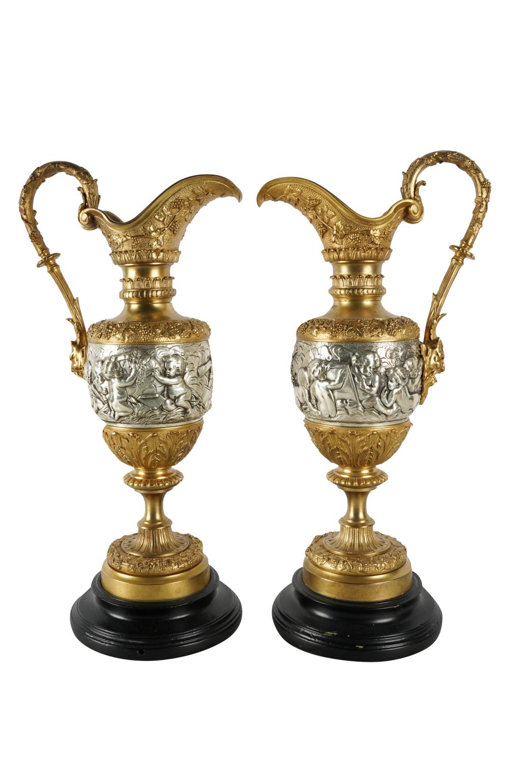 PAIR OF GILT SILVER GILT EWERSin 333541