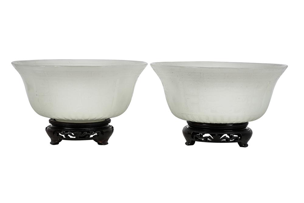 PAIR OF WHITE PEKING GLASS BOWLSrelief-decorated,