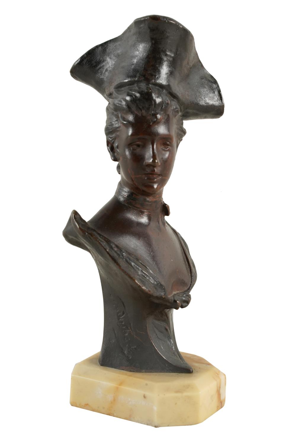 BRONZE BUST OF A WOMANsigned illegibly