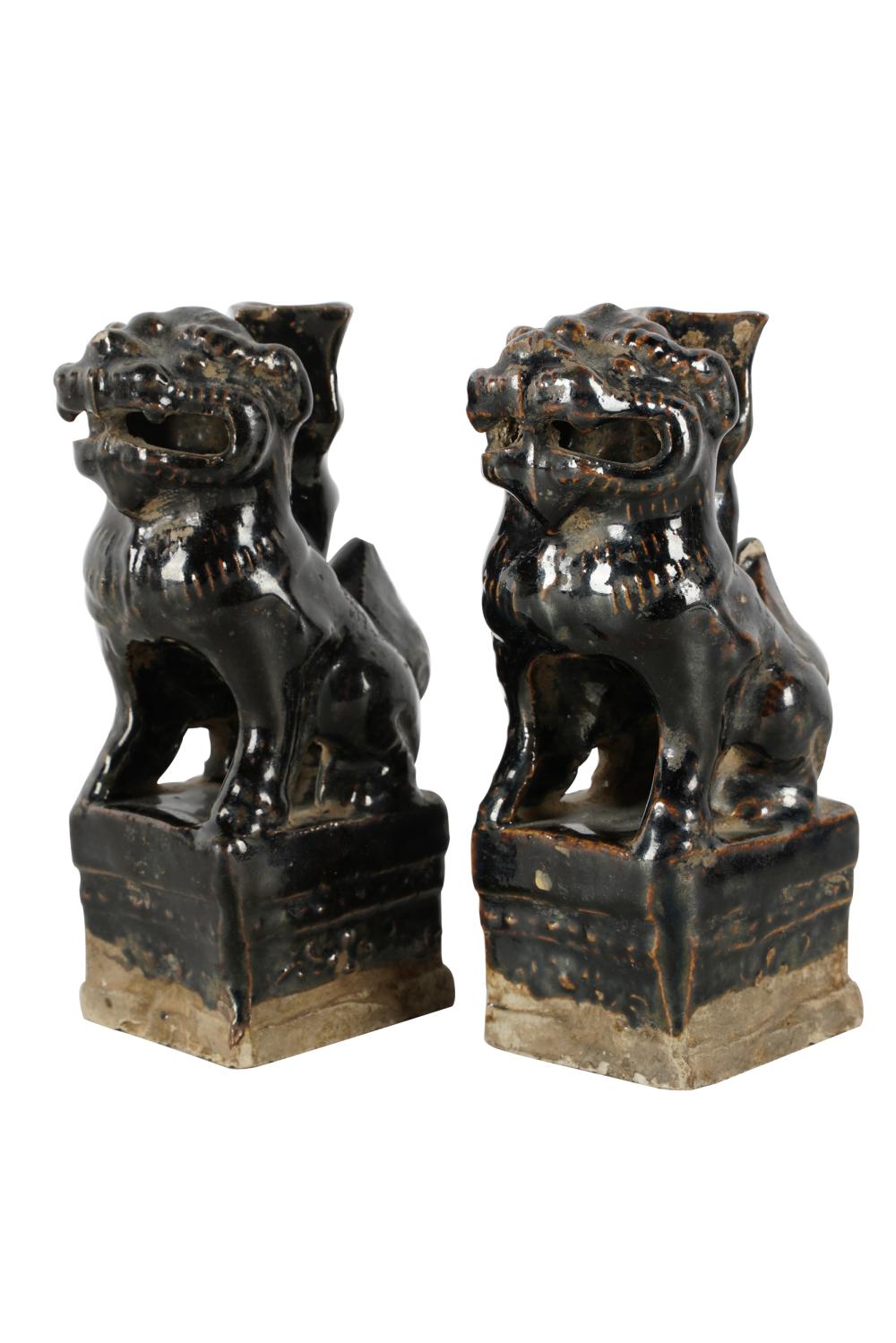 PAIR OF CHINESE BROWN-GLAZED FOO DOGSunsigned;