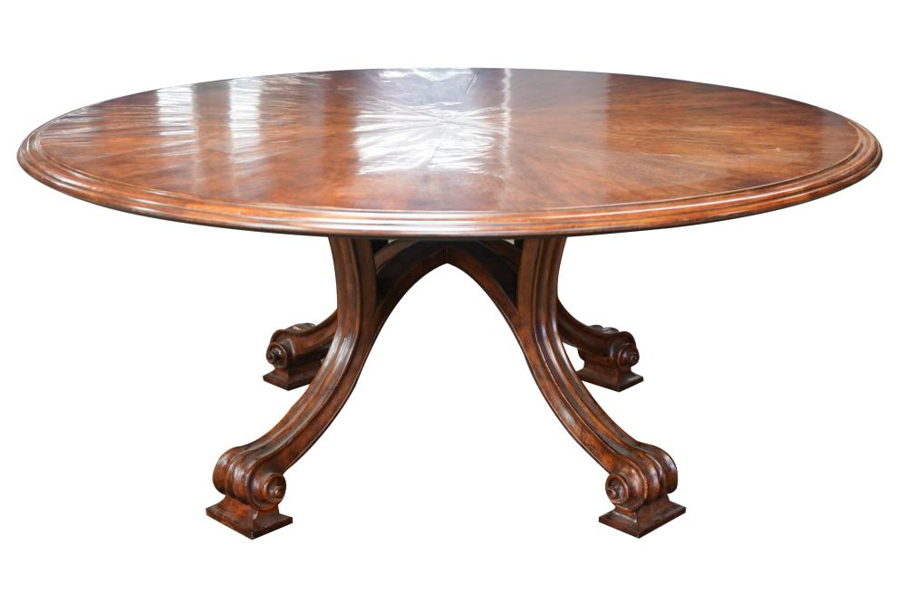 THERIEN WALNUT ROUND DINING TABLEwith