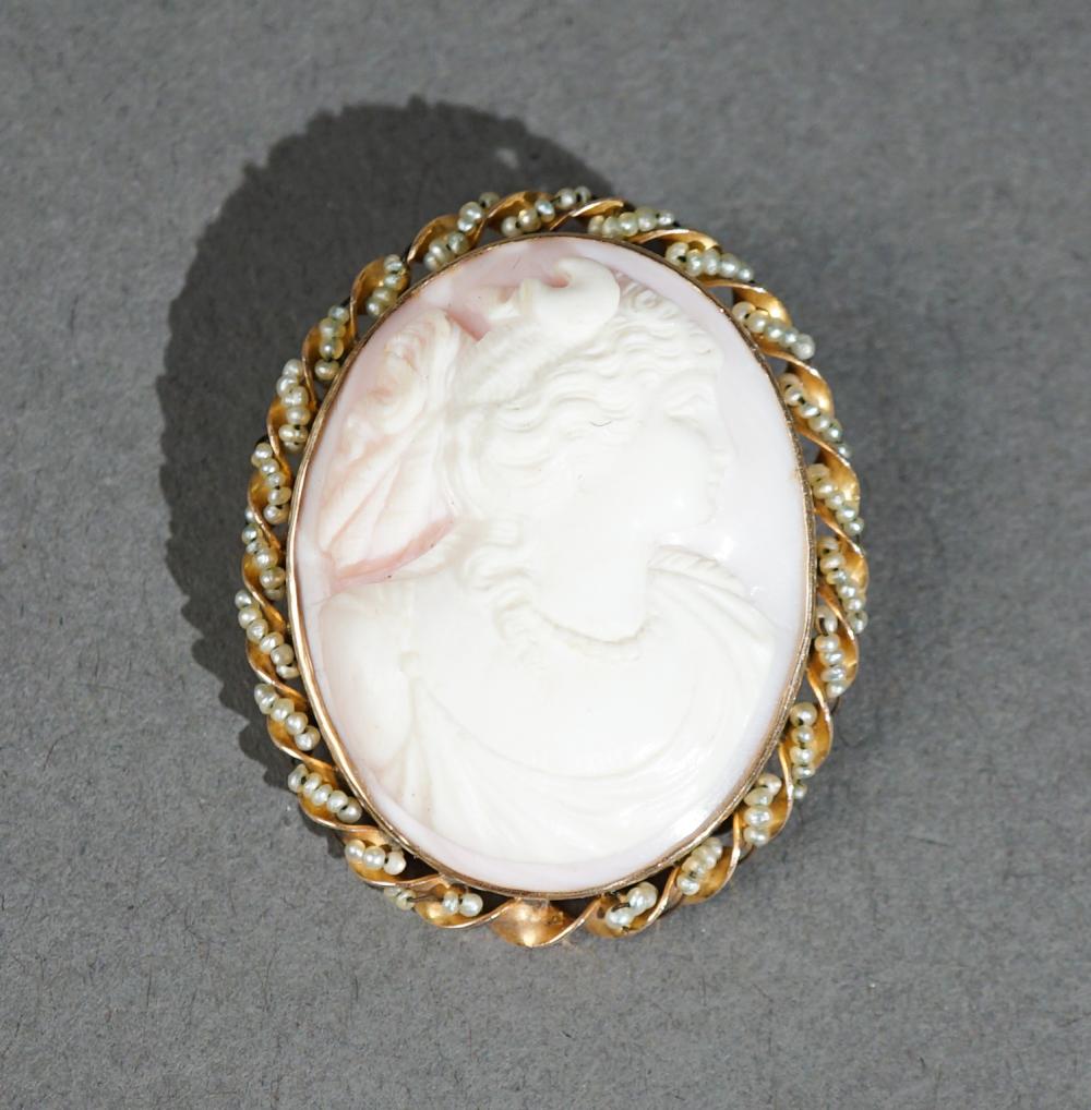 CARVED ANGEL SKIN CORAL CAMEO PENDANT