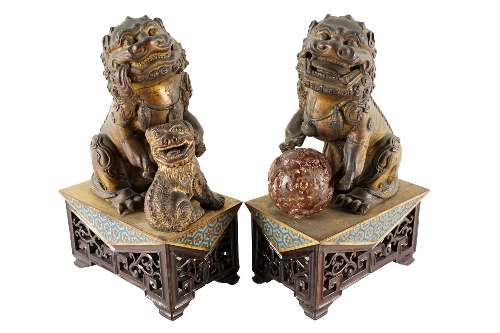 PAIR OF GILT METAL FOO LIONSone