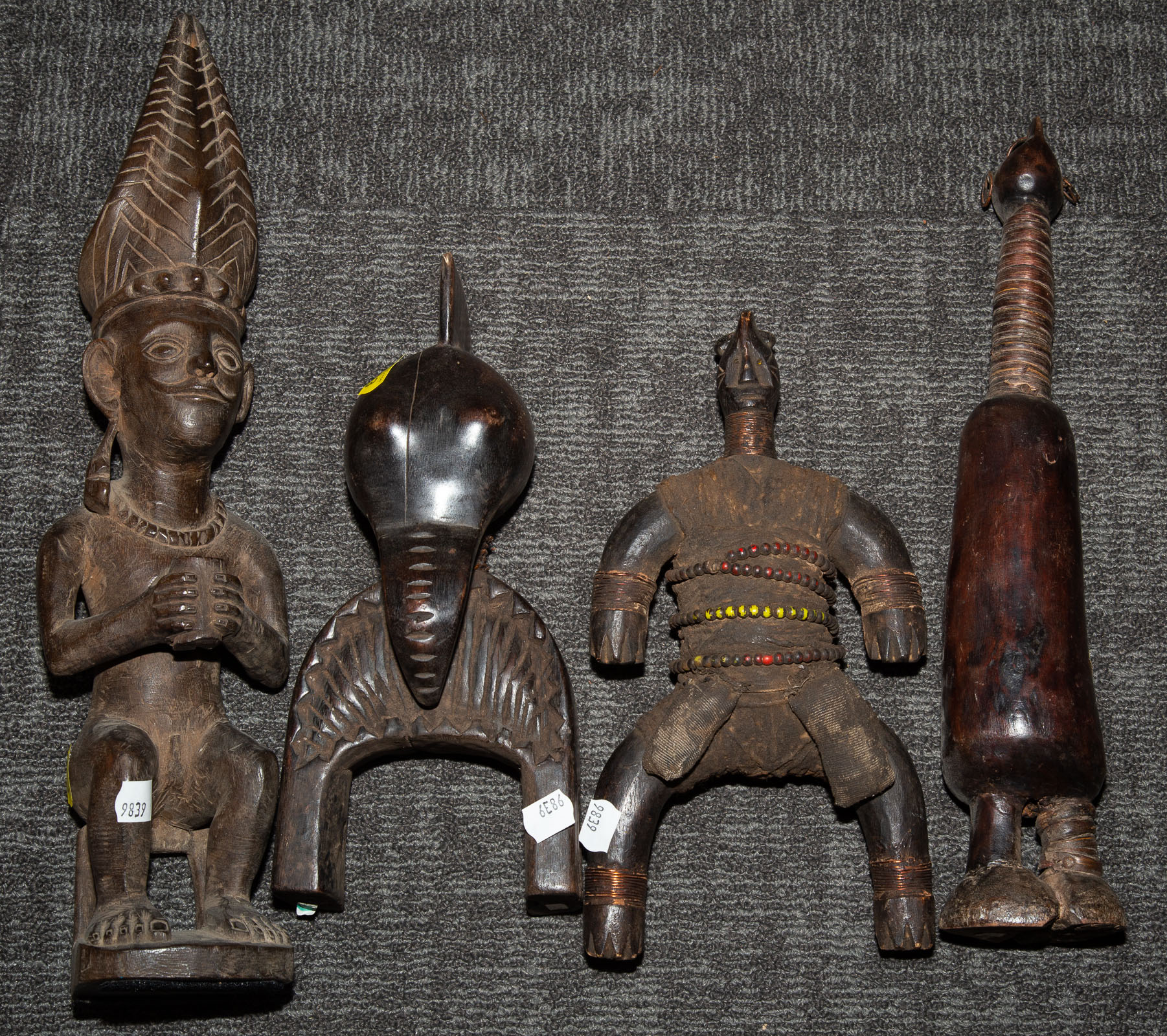 FOUR INDIGENOUS STYLE WOOD CARVINGS