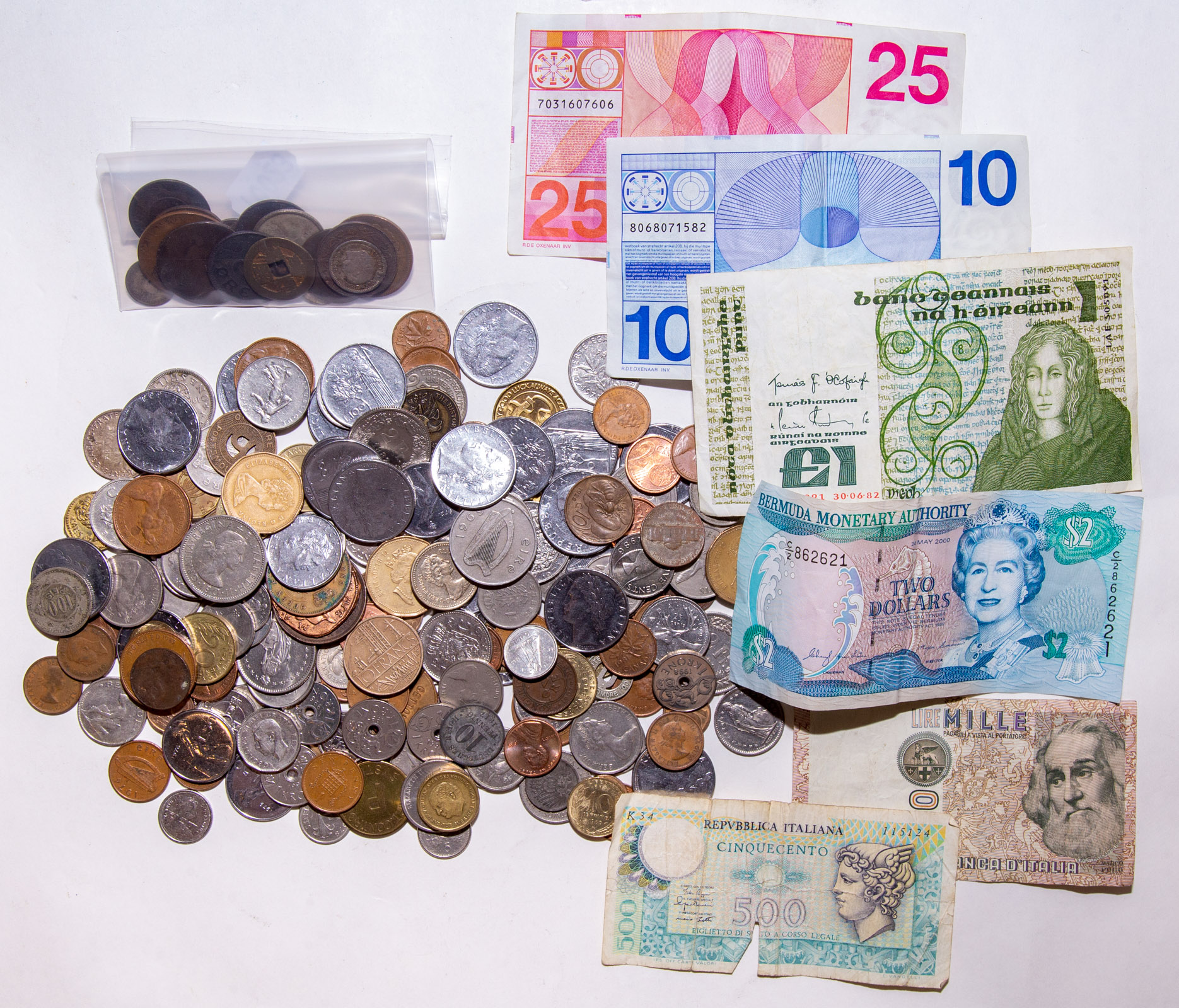 BOX OF WORLD COINS WITH SOME SILVER