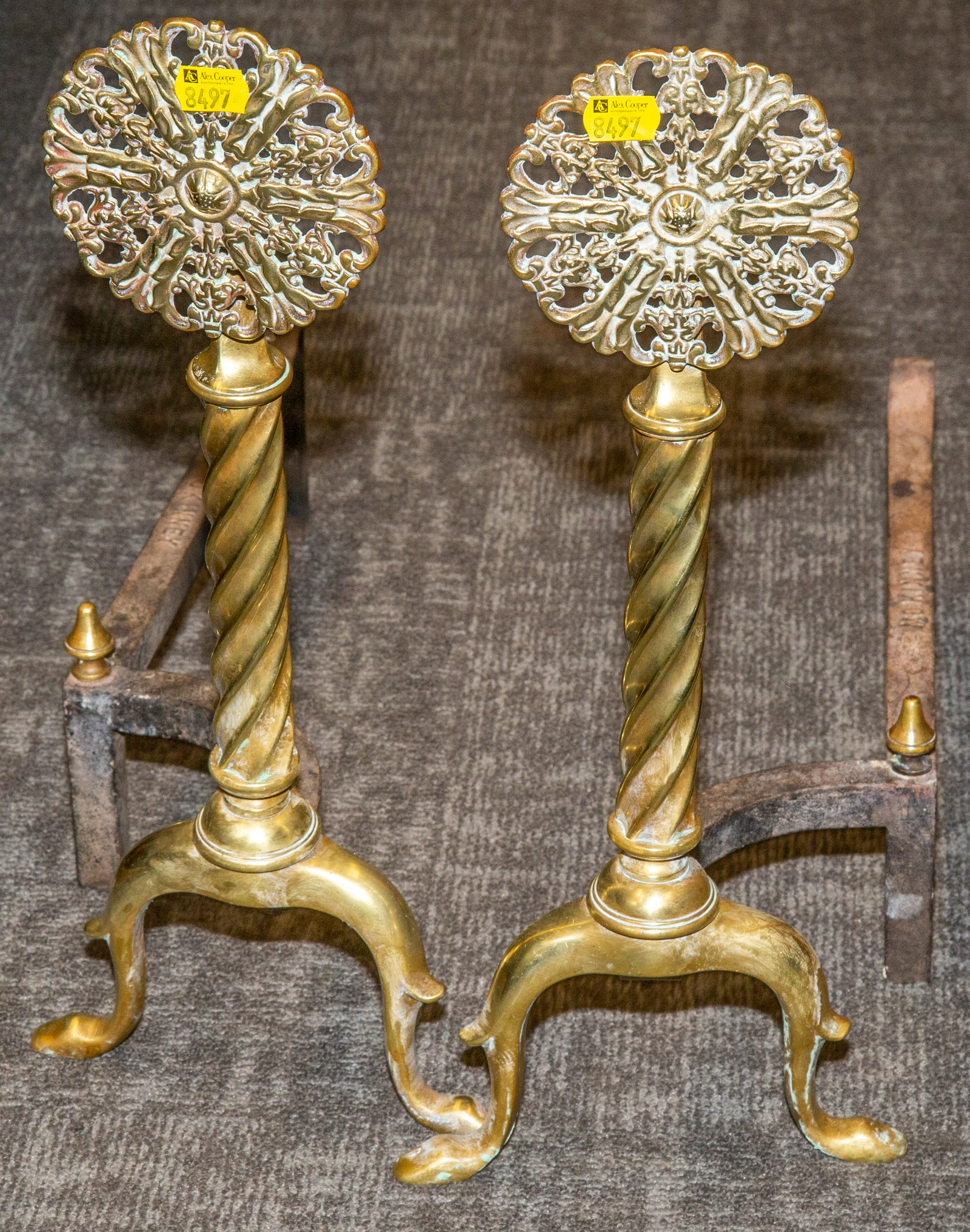 A PAIR OF ANDIRONS .