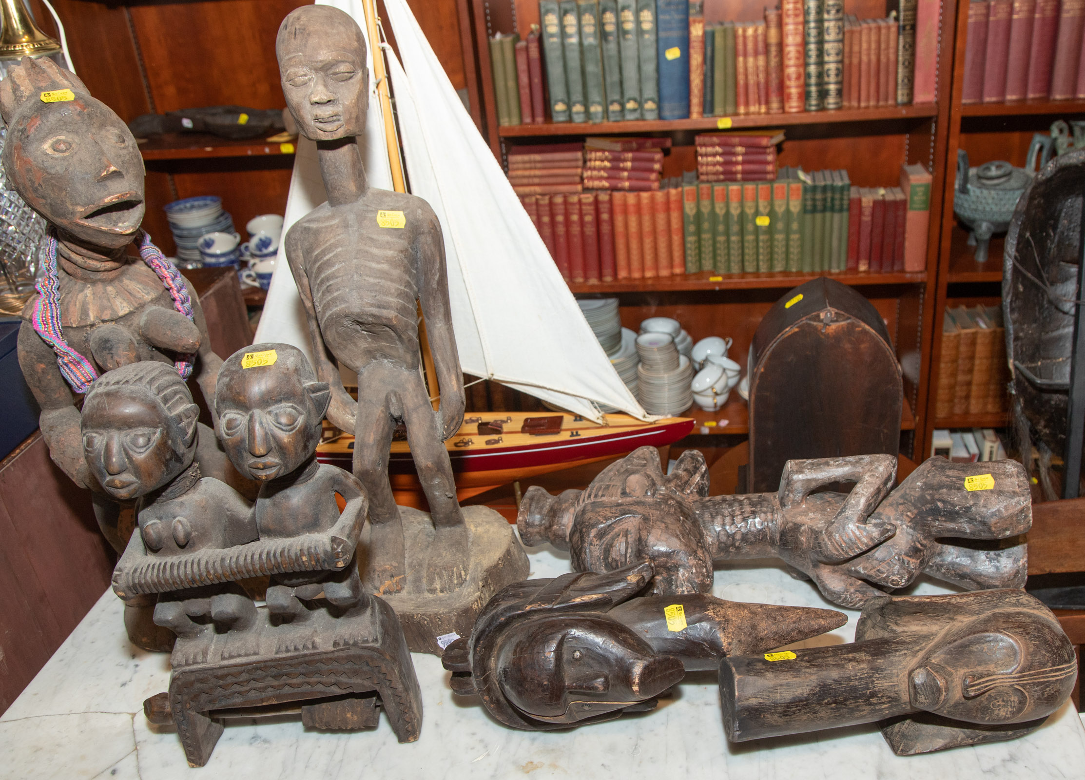 SIX CARVED WOOD AFRICAN FIGURES Including