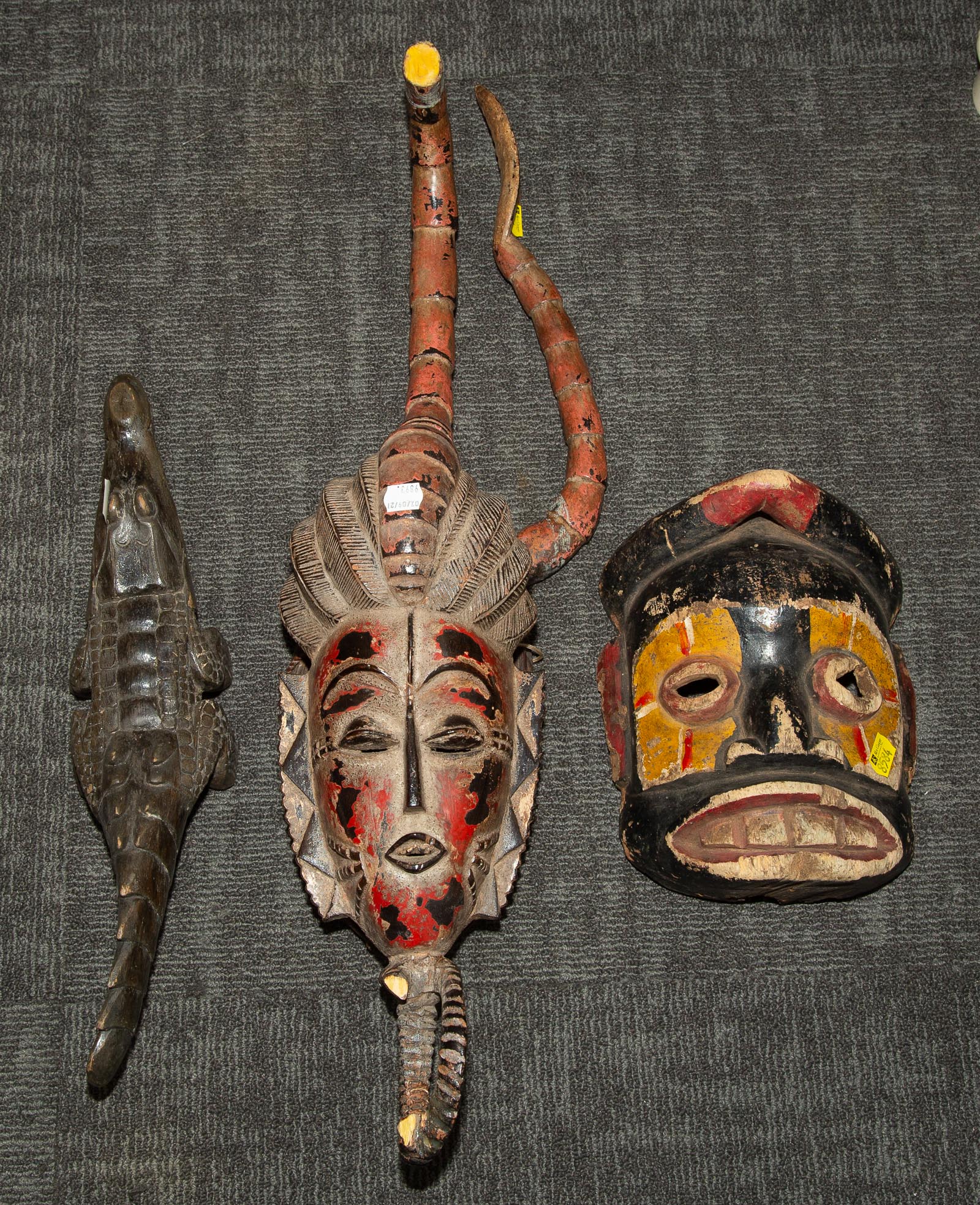 SEVEN AFRICAN CARVED WOOD ARTIFACTS