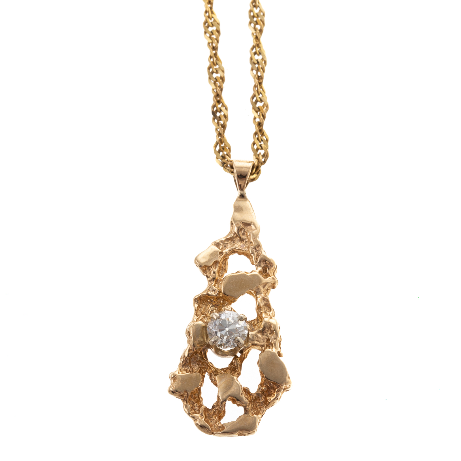 A PIERCED GOLD NUGGET STYLE 14K DIAMOND