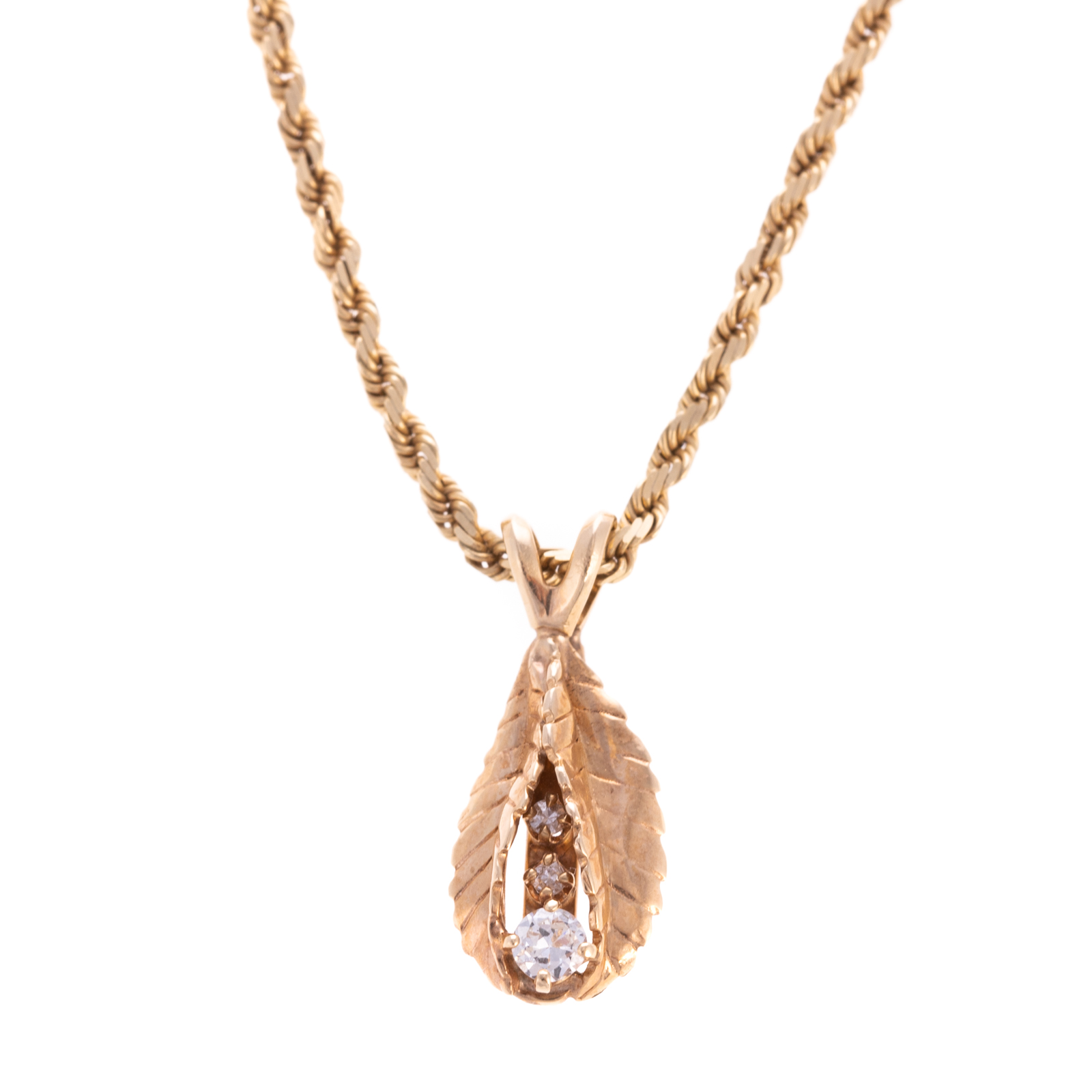 A DIAMOND LEAF PENDANT & CHAIN IN 14K