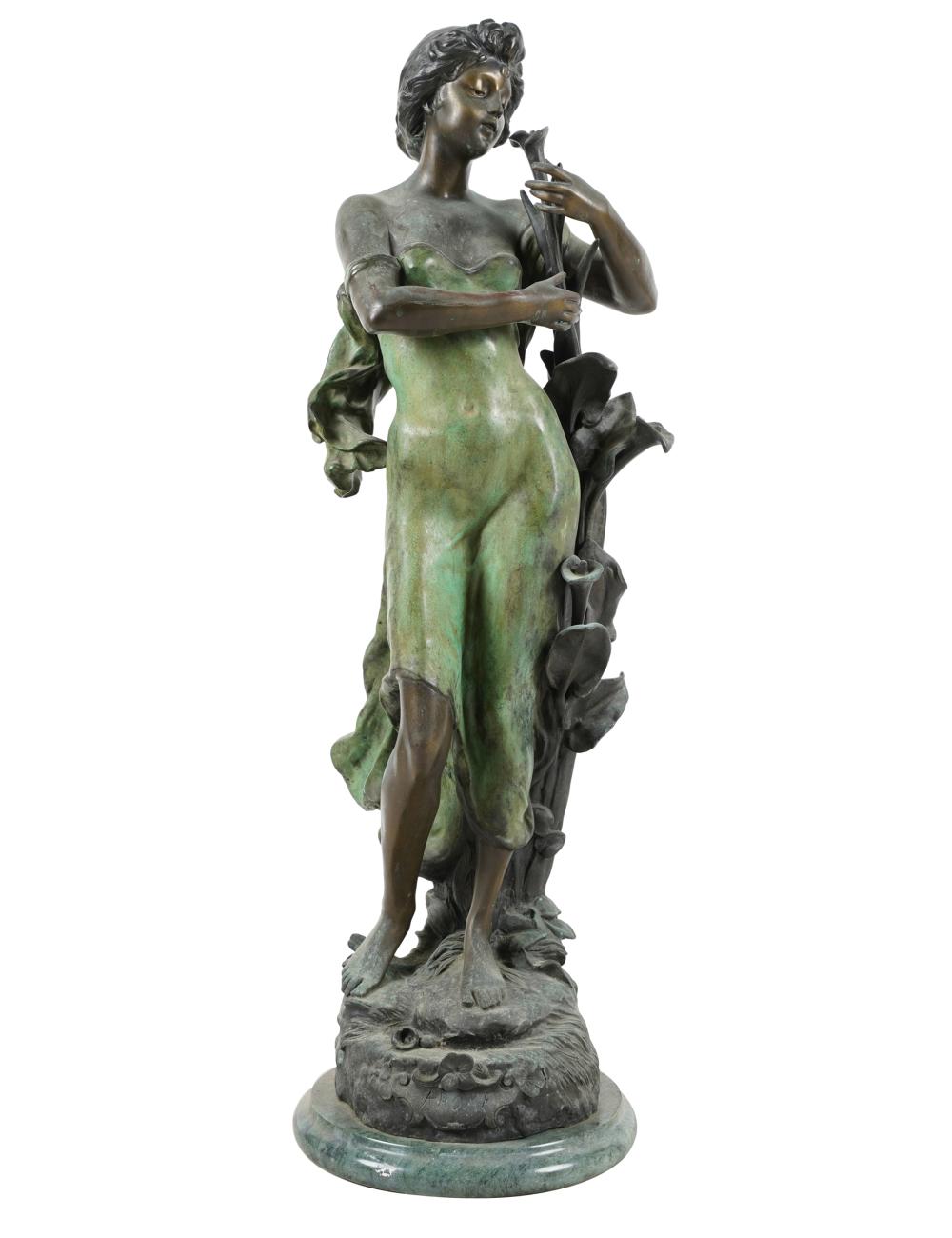 BRONZE FIGURE OF A WOMANinscribed in