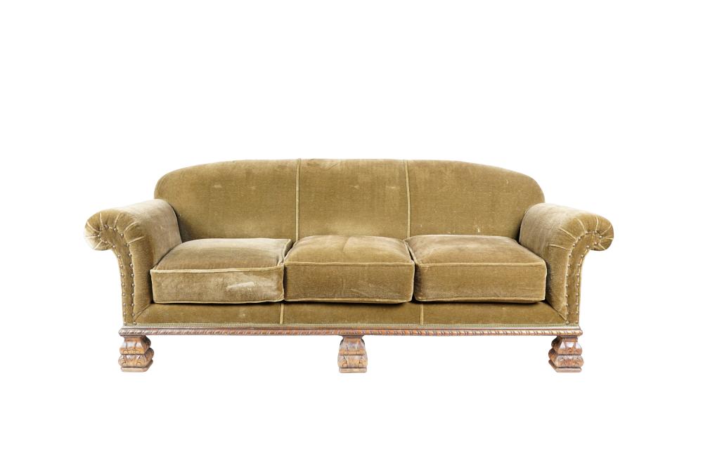 GREEN UPHOLSTERED SOFAcovered with olive