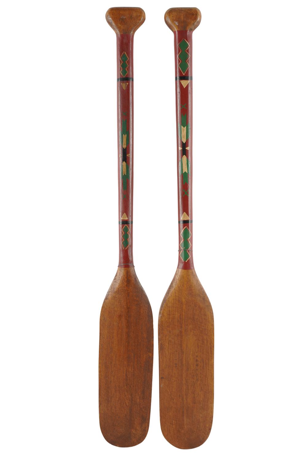 PAIR OF PAINTED WOOD PADDLESProvenance  332104