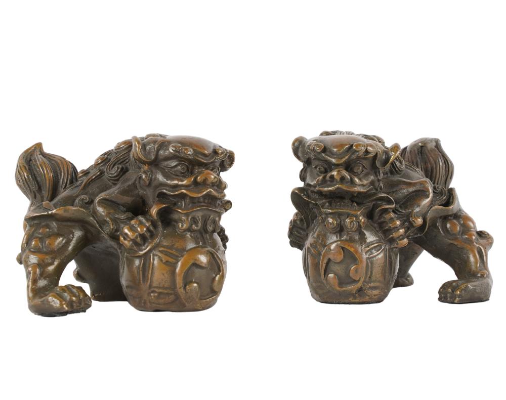 PAIR OF CHINESE BRONZE SCROLL WEIGHTSmodeled 33222f