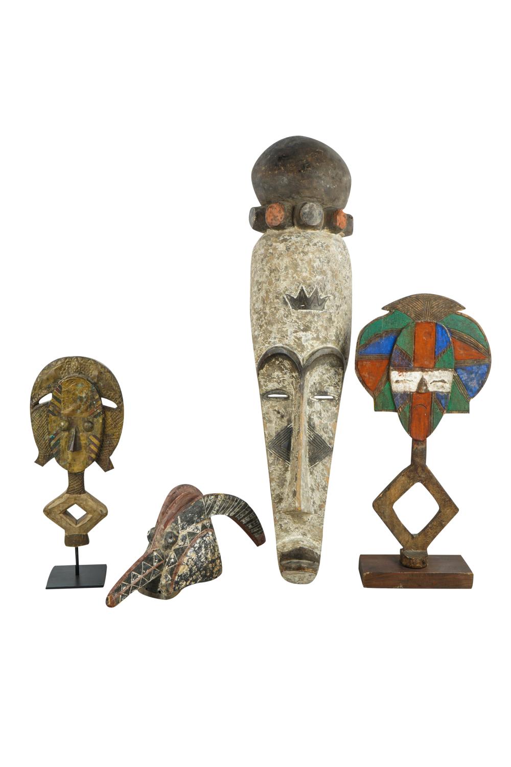 GROUP OF FOUR AFRICAN CARVINGScomprising 33264e