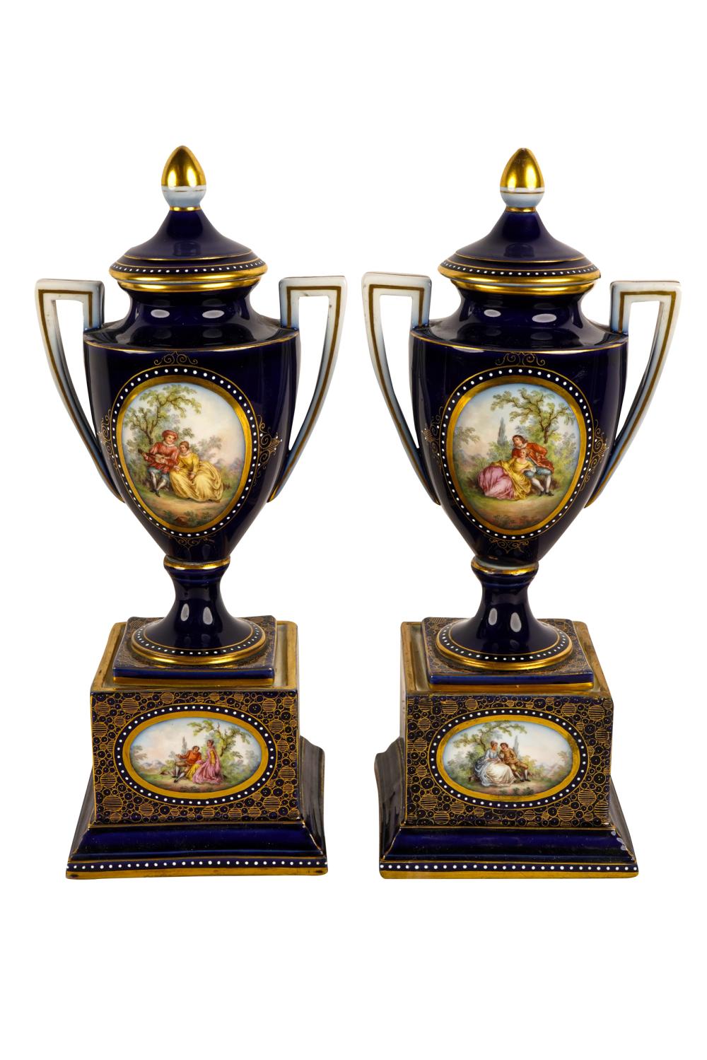 PAIR OF PORCELAIN COVERED GARNITURESwith