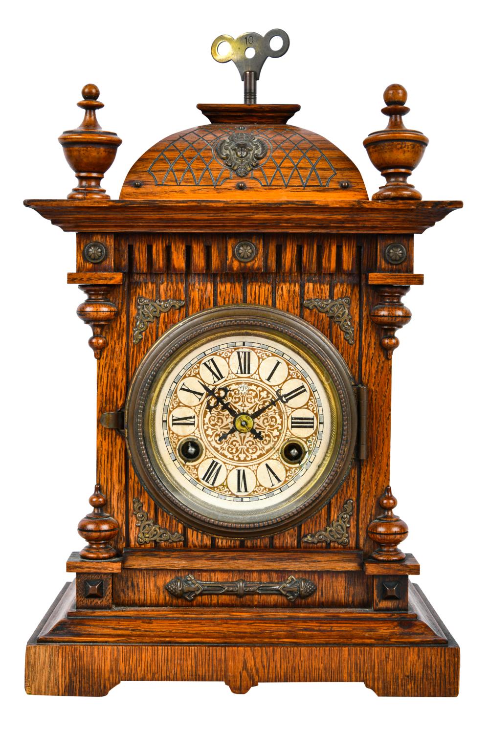CARVED OAK MANTEL CLOCKwith repousse 33290f