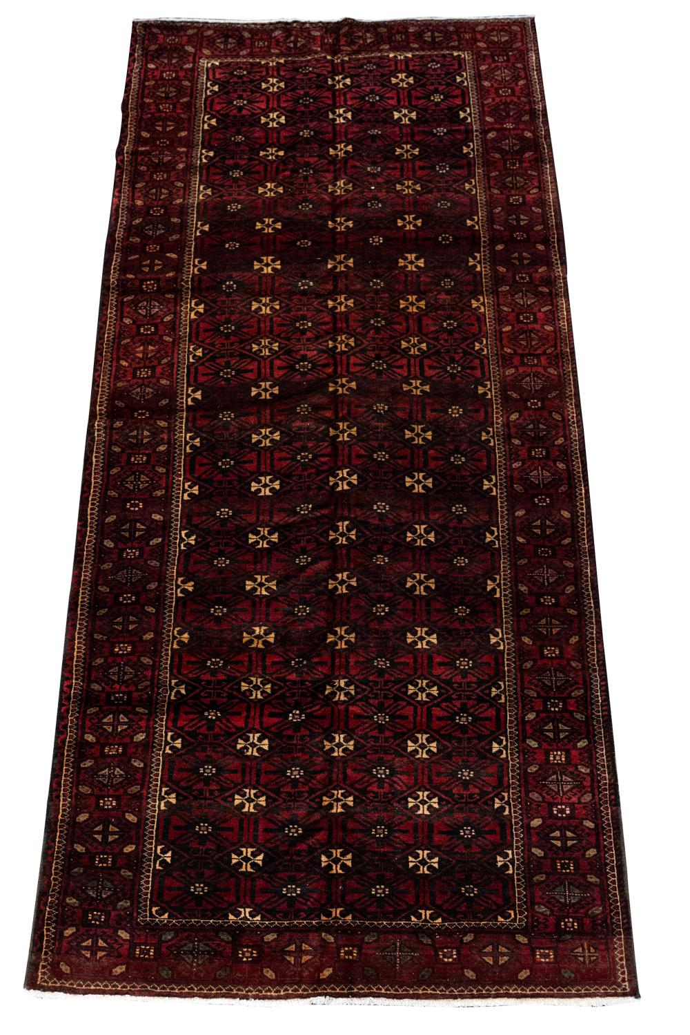 TURKOMAN STYLE AREA RUGwith a multi-medallion