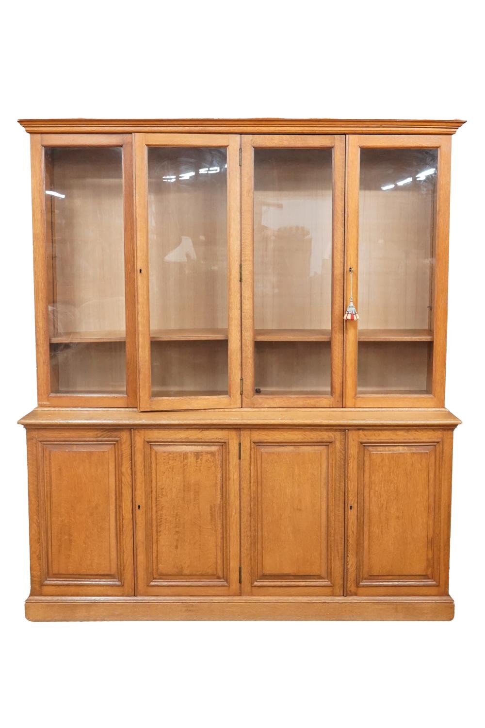 OAK BOOKCASEin two sections, the