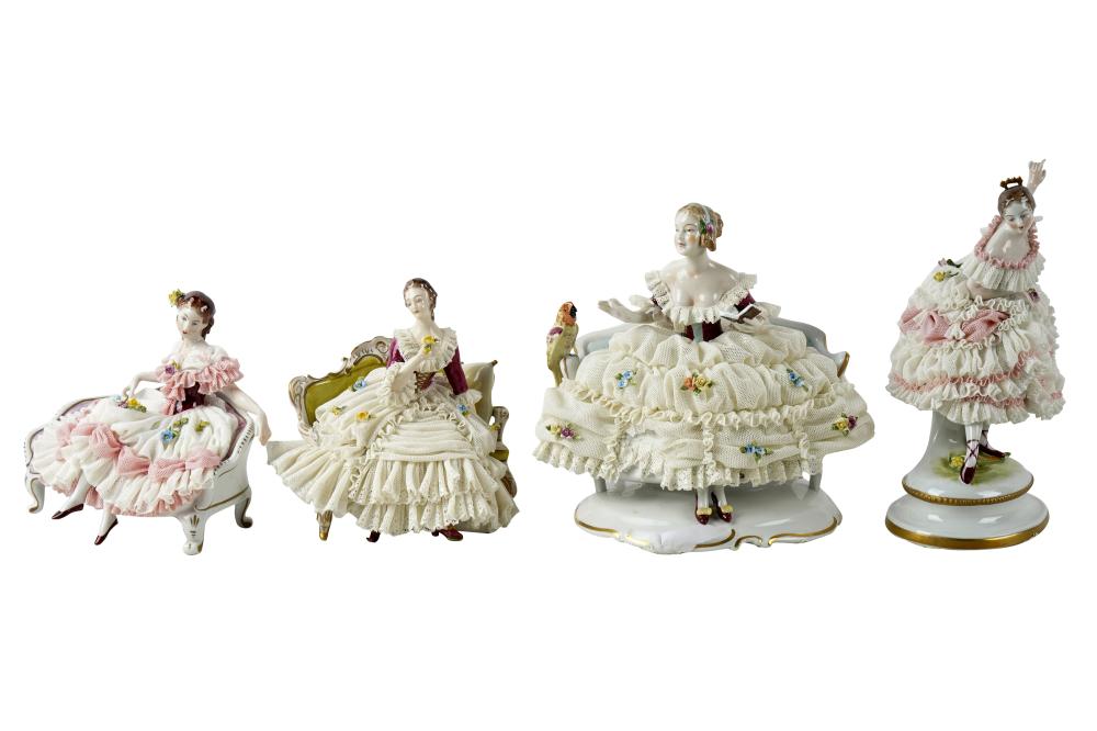 FOUR CONTINENTAL LACE PORCELAIN FIGUREScomprising