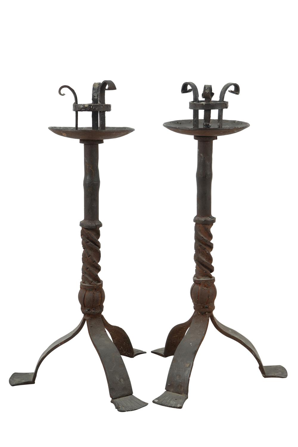 PAIR OF IRON CANDLESTICKSeach set