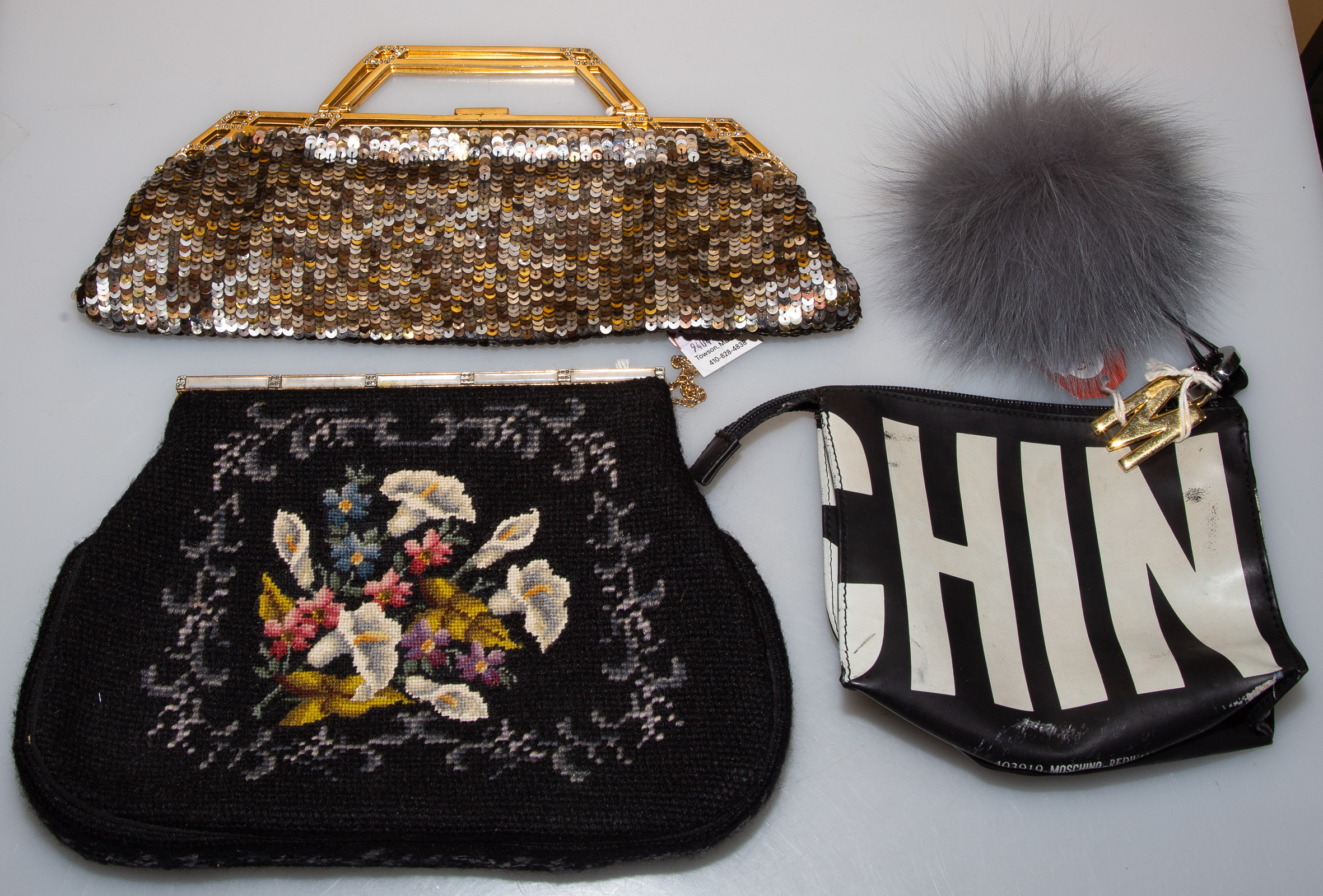 FOUR HANDBAGS Including a Moschino,