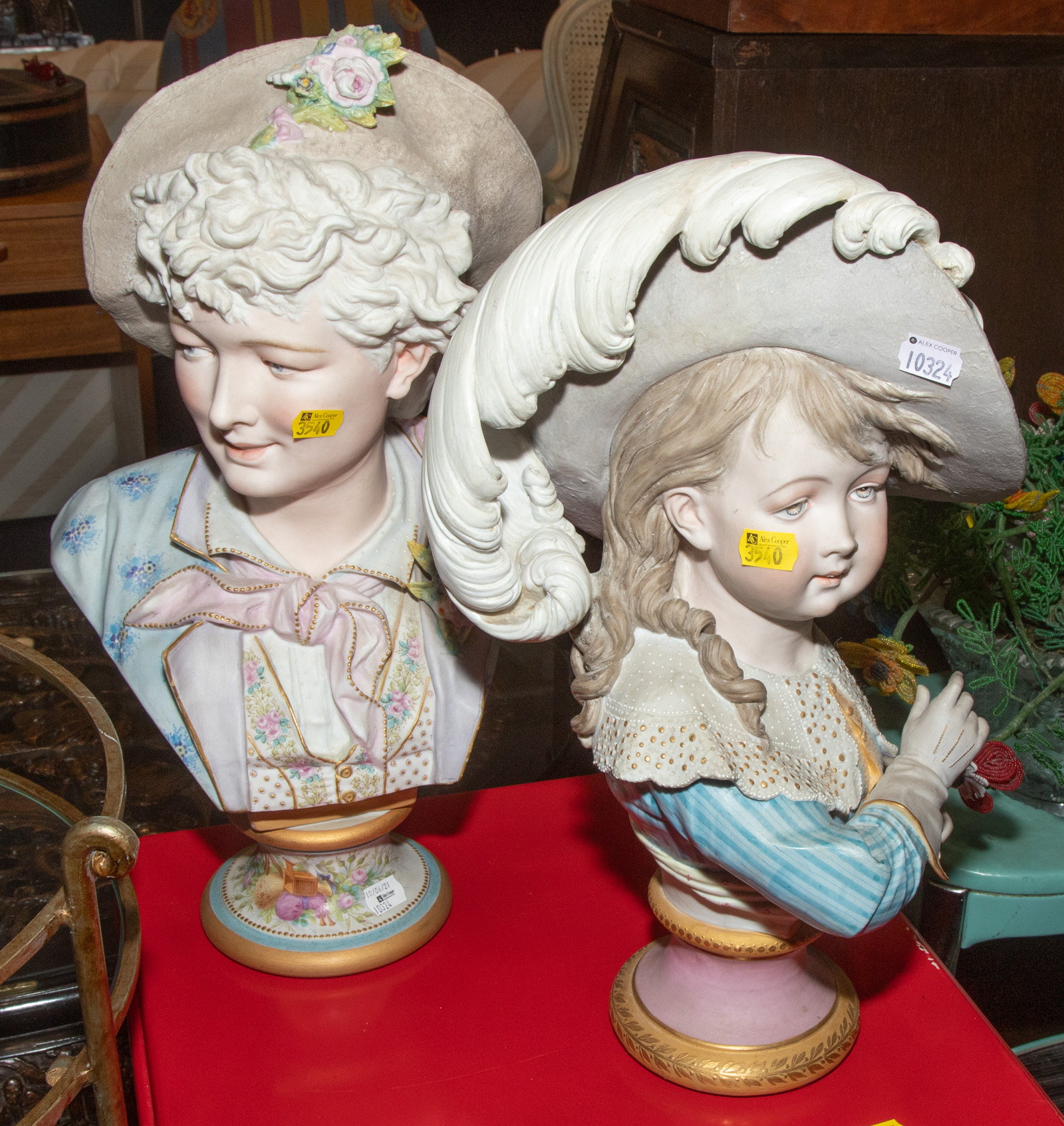 TWO LARGE FRENCH PAINTED BISQUE BUSTS