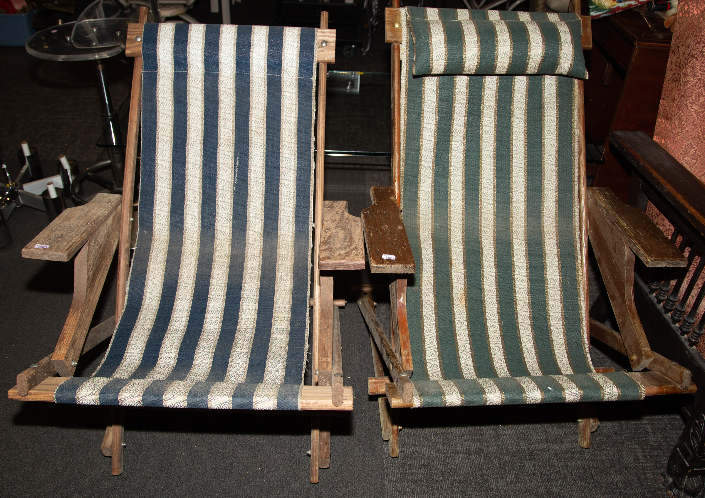 TWO FOLDING DECK CHAIRS .