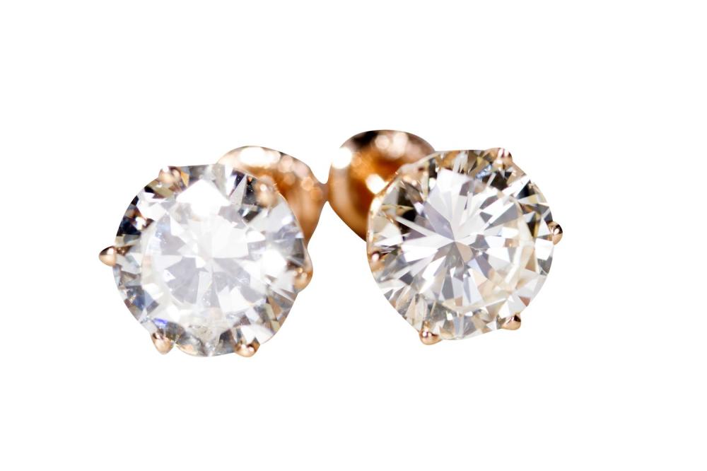 PAIR OF 14 KARAT & DIAMOND STUDSstamped