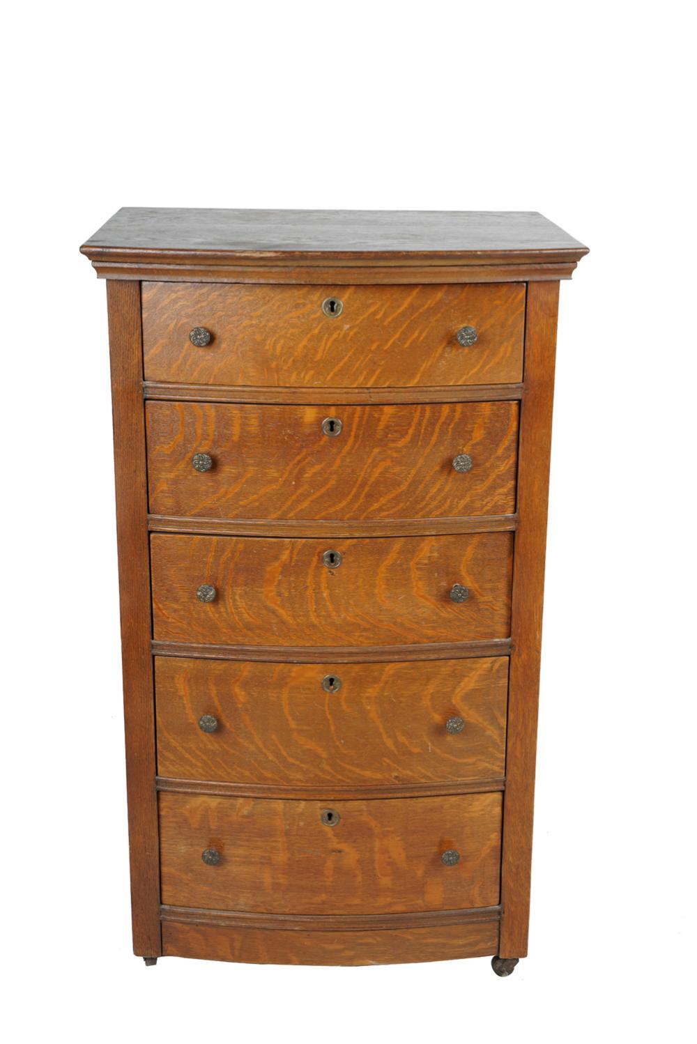 NARROW OAK FIVE- DRAWER CHESTProvenance: