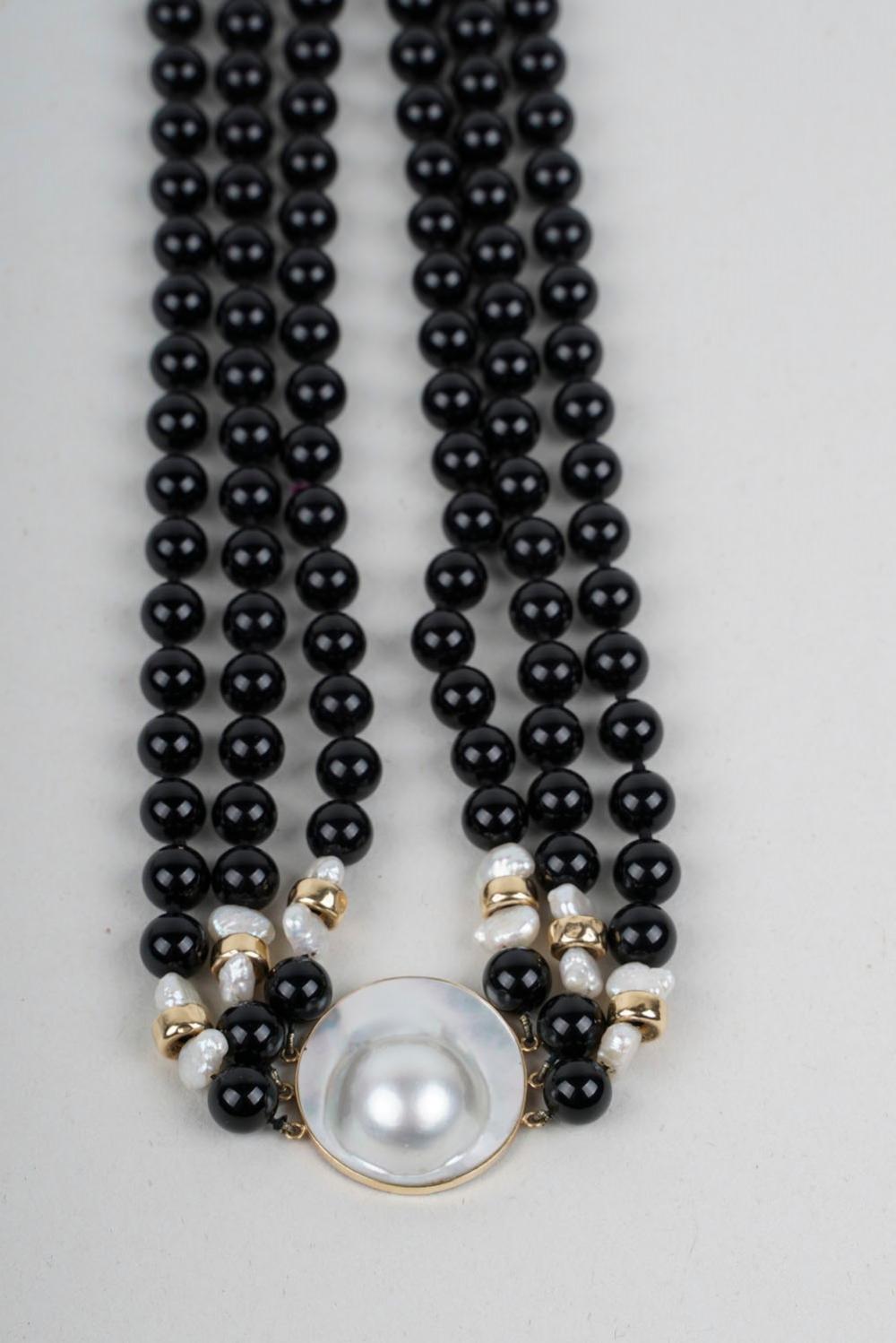 14 KARAT GOLD CULTURED PEARL  335d3b