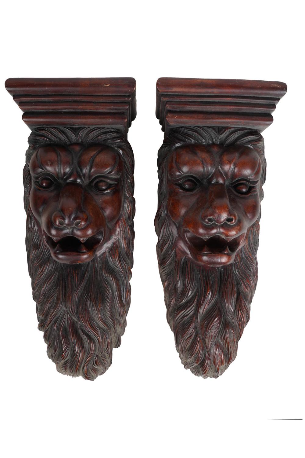 PAIR OF CARVED WOOD LION BRACKETSCondition: