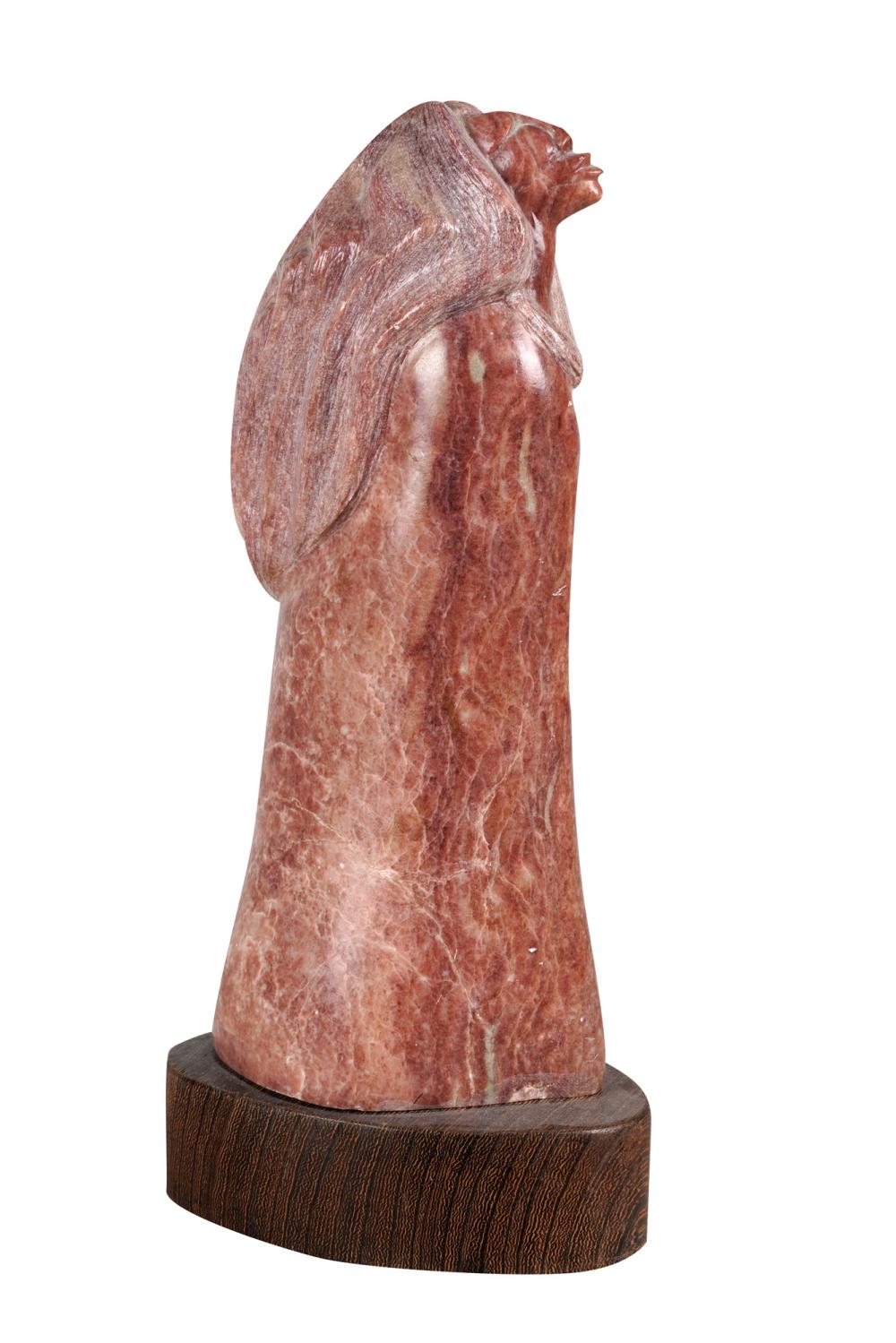 CARVED STONE FIGURE OF A NATIVE