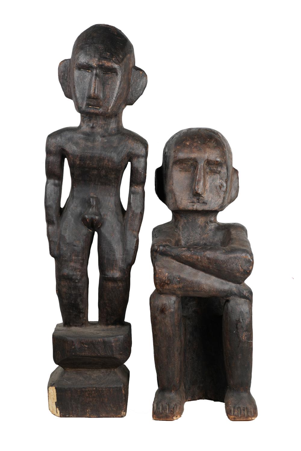 TWO PRIMITIVE WOOD CARVED FIGURESProvenance: